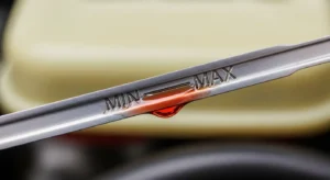 checking transmission fluid level marks on dipstick