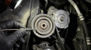 faulty pulley or tensioner causing belt noise