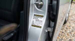finding recommended tire pressure sticker inside car door