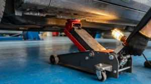 correct placement of hydraulic car jack under vehicle