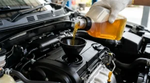 regular engine oil change preventing sludge buildup