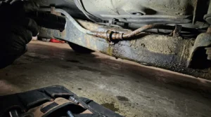 damaged brake line causing brake fluid leak